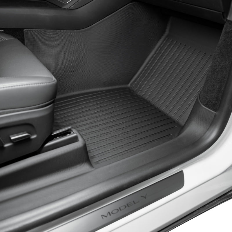 Passenger-side Tesla Model Y Juniper TPE liner installed