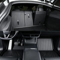 MoldedFit driver-side floor liner with metal footrest plate — Tesla Model Y Juniper